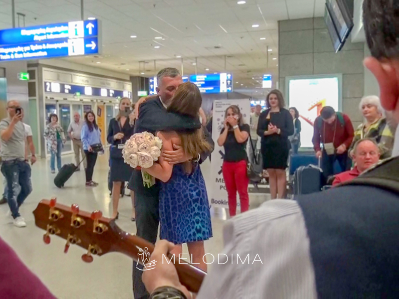 Russian wedding proposal with rock music in Athens International Airport